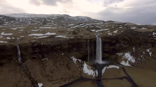 Seljalandsfoss waterfall in Iceland aerial panoramic view at sunrise