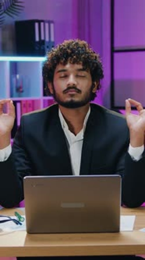 Portrait of Peaceful Likable Positive Bearded Muslim Office Manager in Formal Wear Which Enjoying