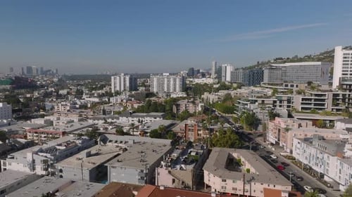 Fly Above Town Development in Urban Neighbourhood High Rise Office Buildings in Distance Los Angeles