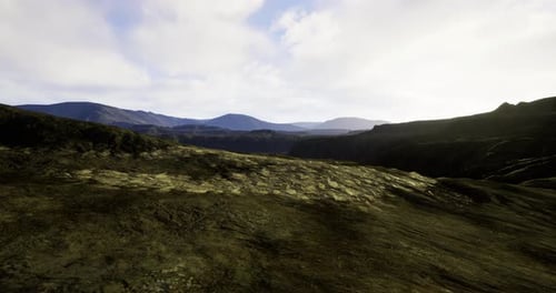 Breathtaking View of Rugged Mountains Under a Serene Sky in Early Morning
