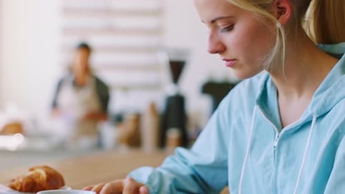 Woman, tablet or startup planning in coffee shop, restaurant or cafe in Canada