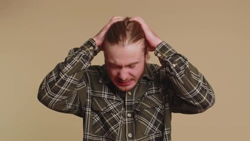 Man Showing Range of Negative Emotions, Expressive Face