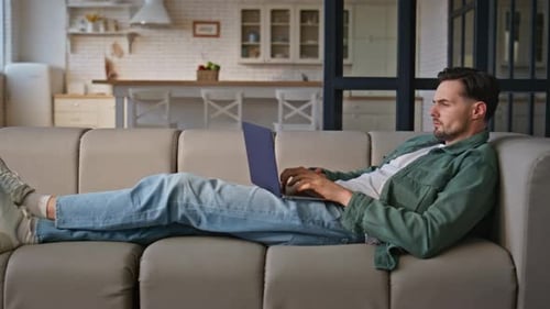 Lying Businessman Working Laptop Computer at Remote Office Freelancer Surf Web