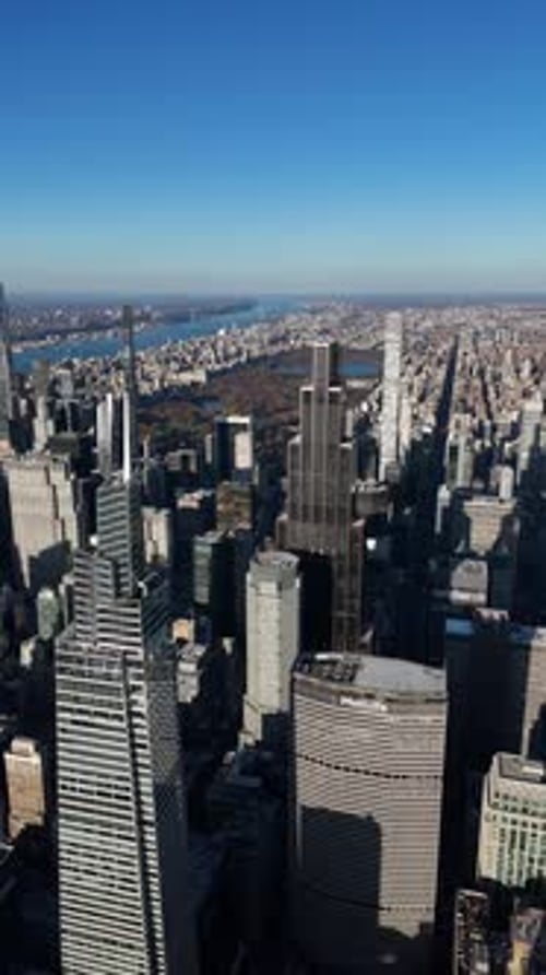 Aerial video above skyscrapers and skyline in Manhattan, New York