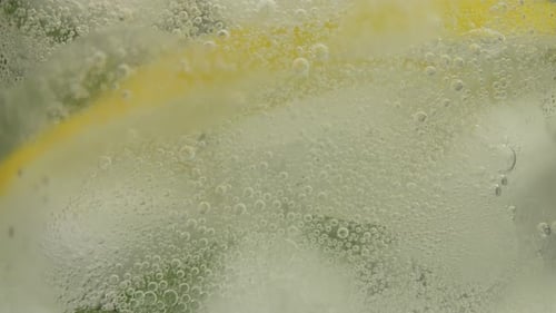 Macro Close Up of a Lemon and Ice Drink