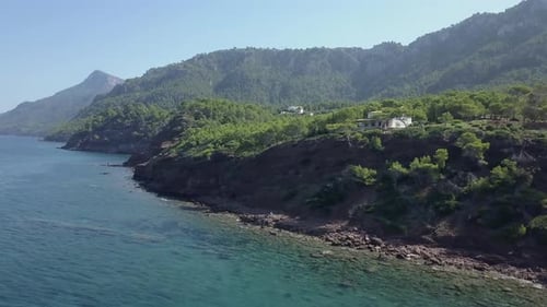 View From the Top of Pine Clad Mountains By the Sea Water