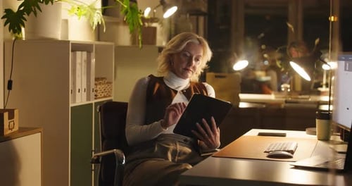 Thinking, tablet and reading with business woman in office for chief editor