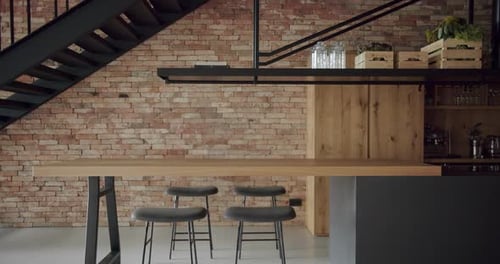 Stylish Kitchen Interior with Brick Wall and Island