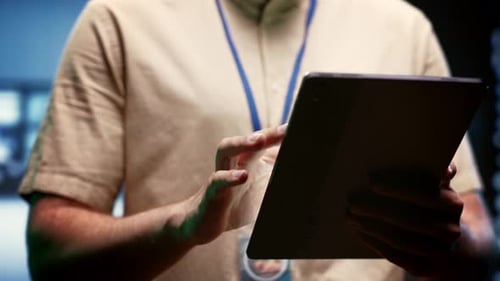 Man Using Tablet Device in Modern Office