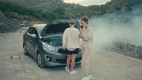 The Car Broke Down on a Country Road White Smoke Under the Hood