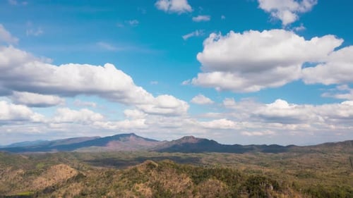 beautiful landscape High mountains with moving clouds on the blue sky. clear sky.