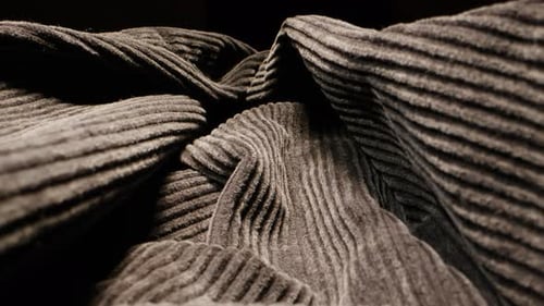 Close Up on Textured Gray-Brown Fabric