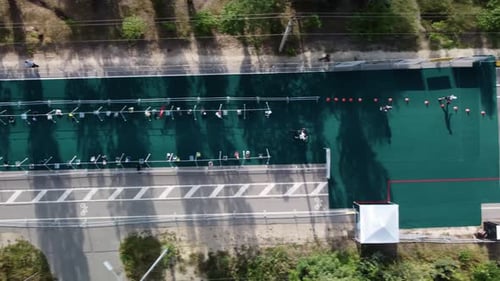 Athletes Compete in Triathlon Aerial Birds Eye View