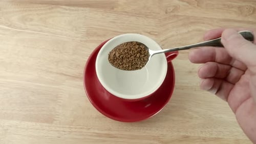 Close Up Teaspoon Coffee Into Red Mug Freezedried Coffee Dipped Into Red Cup Coffee Granules