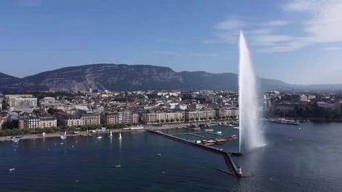 Lake Geneva with Water Fountain and Swimming Area, Aerial Pullback