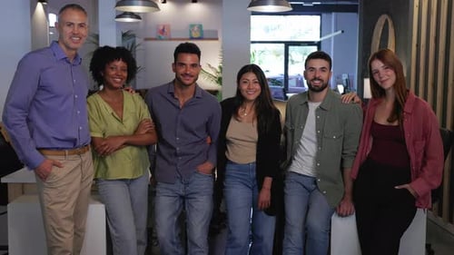 Portrait of Diverse Coworkers Standing Together in Modern Office
