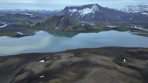 Aerial view of lake near mountains, Iceland.