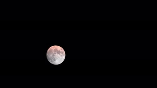 Lunar Eclipse Time-Lapse in Black Sky