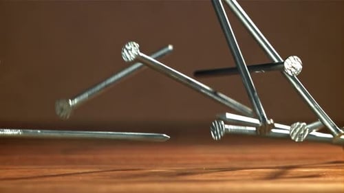 Nails Fall on the Carpenter's Worktable Filmed on a Highspeed Camera at 1000 Fps