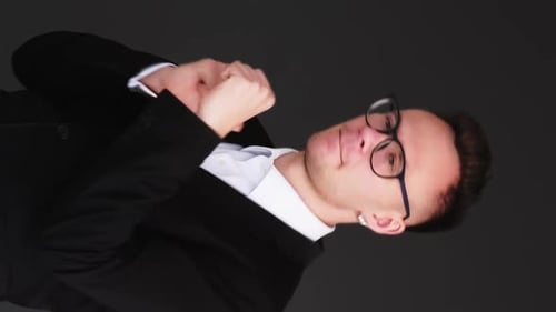 Man in Suit Jacket Dancing