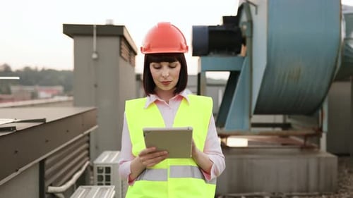Busy Lady Using Tablet to Checking Serviceability of Devices