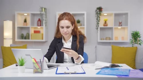 Home office worker woman doing online shopping.
