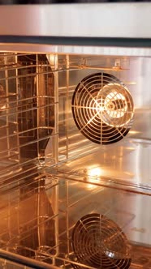 Oven with metal racks for baking pastries