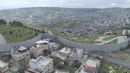Aerial footage of the separation wall between Israel and the Palestinian Authority in Jerusalem