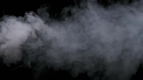 Jet Stream of Smoke or Vapor on Black Background in Slow Motion