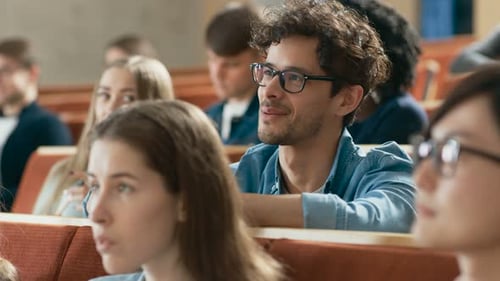 Students Listening Attentively in College Lecture Hall