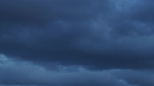 Dark Ominous Storm Clouds Moving Across the Sky
