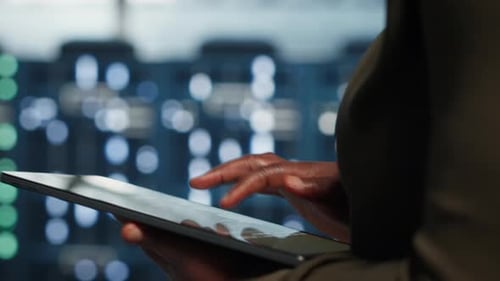 Engineer Automates Data Center Operations with Laptop Computer in Data Center