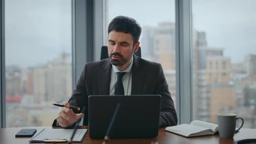 Busy Manager Video Calling Sitting Office Desk Close Up Man Talking at Webinar