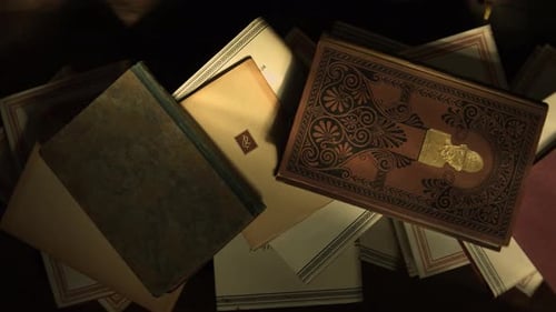 Top View of a Stack of Old Books on a Table