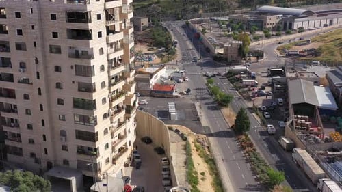 Security wall with Israeli idf watch tower Close to Shuafat Refugee Camp- Aerial
