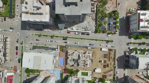 Aerial Video of Tower Crane Assisting Concrete Beam Placement