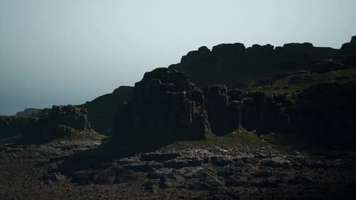 Massive Rock Formation Adorning Mountain Side