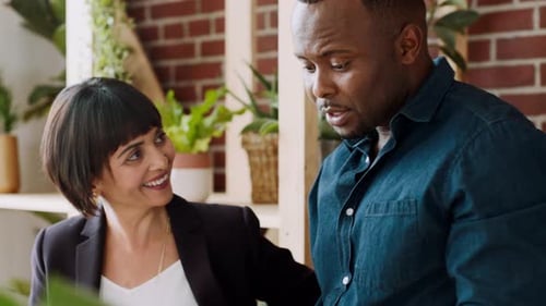 Business people, talking and planning on computer in marketing agency for collaboration