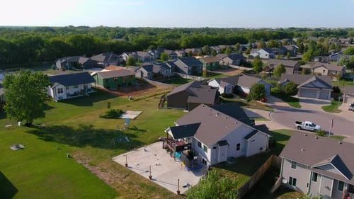 4k Aerial view of single family residential housing construction in suburban neighborhood
