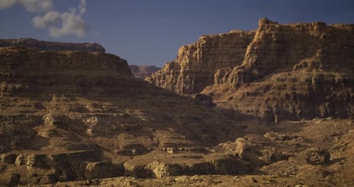 Vast Desert Landscape Revealing Eroded Rock Formations and Rugged Terrain