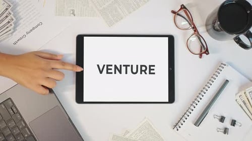 Overhead of 'Venture' on Tablet in Workplace Setting