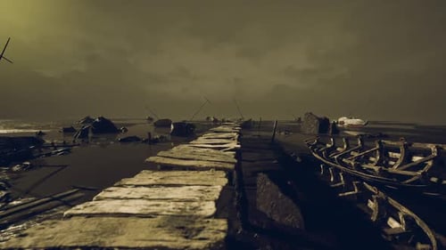 Dark Coastal Pier at Sunset with Boats and Moody Clouds