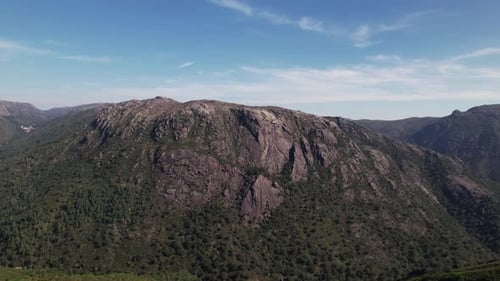 Flying Over Stunning Mountain Rocks