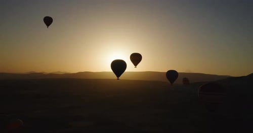 Hot air balloons in Cappadocia, Turkey, at sunrise