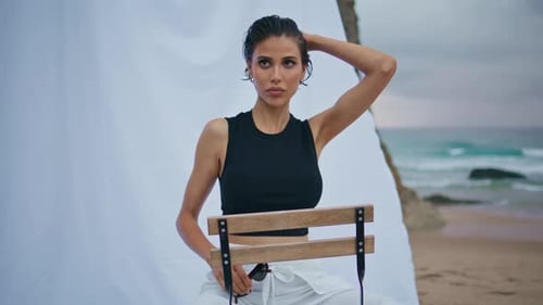 Attractive Model Posing Beach at Ocean Waves Stylish Serious Woman Rest Shore