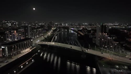 City at Night Aerial with Traffic on Bridge