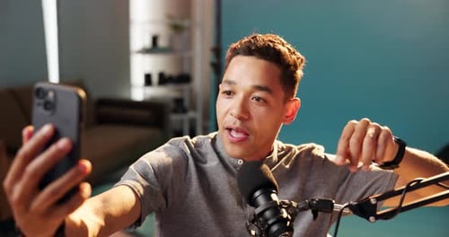 Live streaming, content creator and phone with man and vlog for microphone