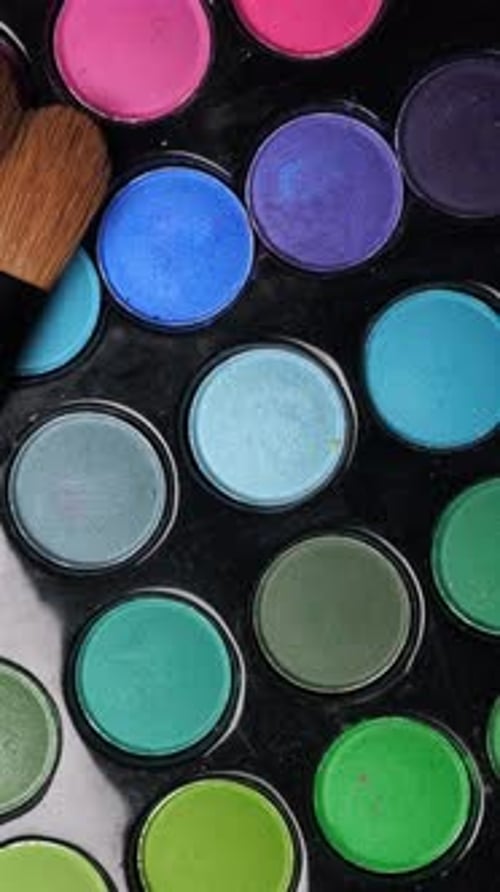 Professional Makeup Eyeshadows Palette and Brushes for Makeup Artist Closeup Rotation Vertical