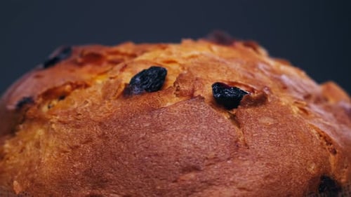 Traditional English Christmas Cake Tied with a Jute Thread on the Black Background Italian Classic
