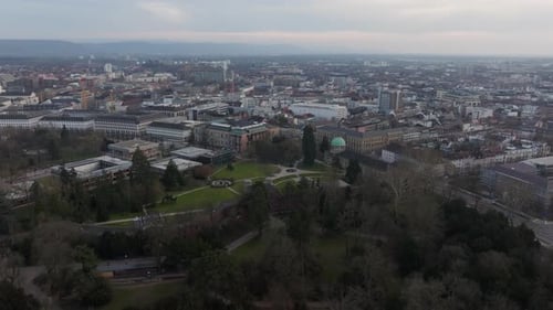 Aerial View Gliding Over the Cityscape of Karlsruhe Germany Capturing the Mix of Buildings and
